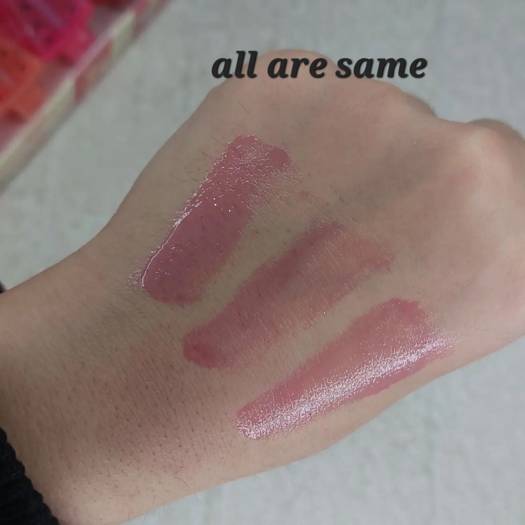 huda moji tinted lip oils
