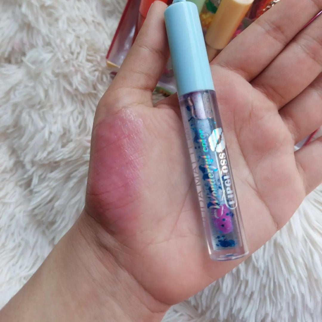 huda tinted lip oil