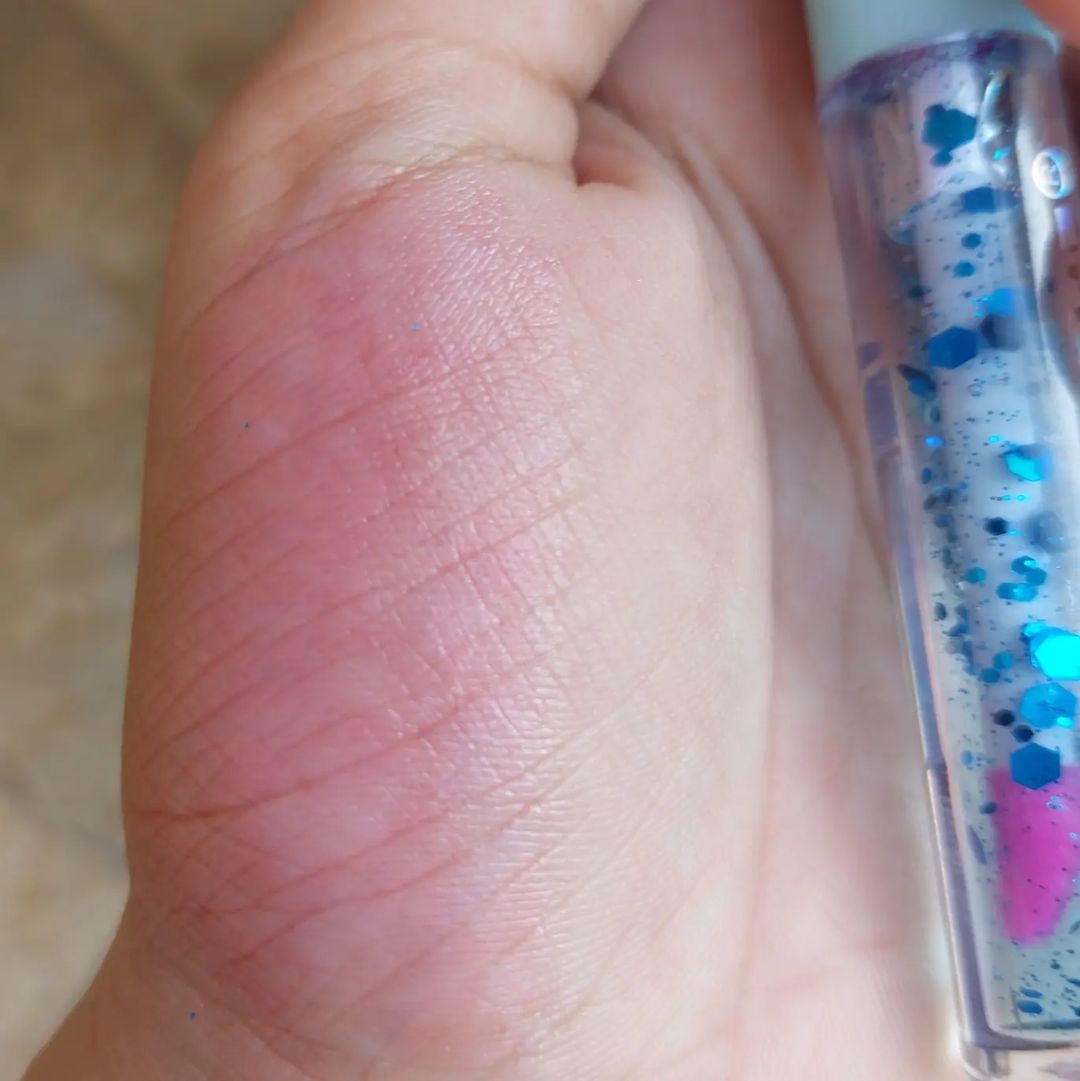 huda tinted lip oil