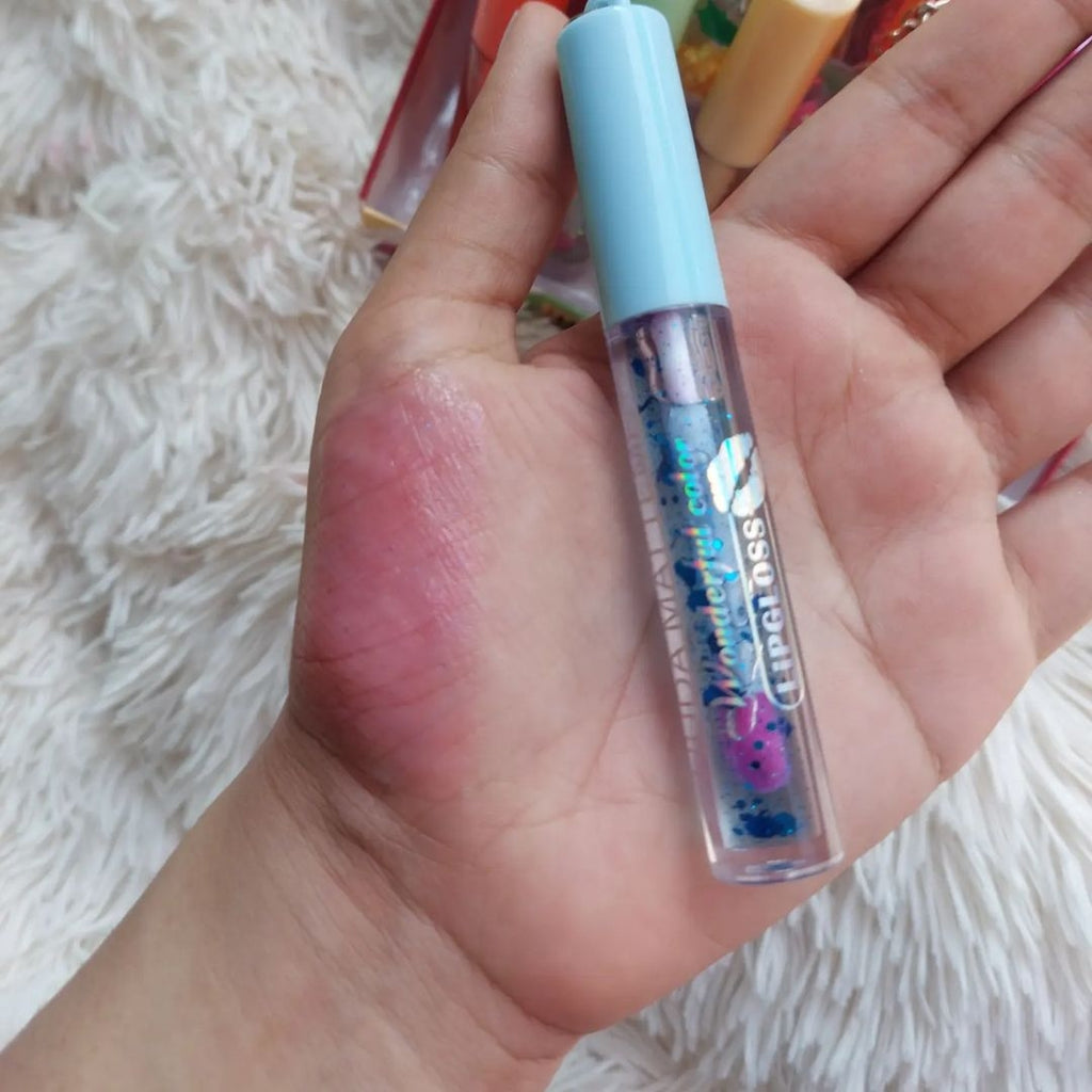 huda tinted lip oil